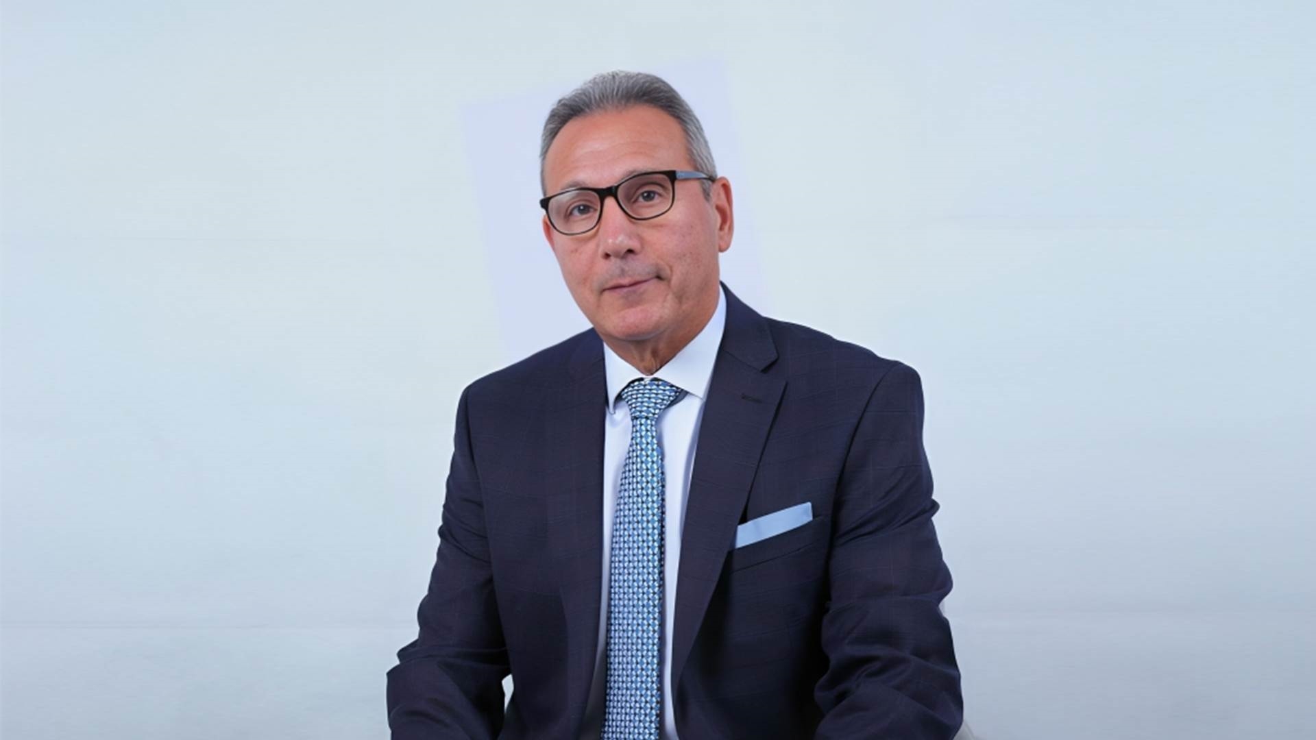 محمد الإتربي الرئيس التنفيذي للبنك الأهلي المصري ورئيس اتحاد بنوك مصر  FirstBank