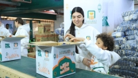 البنك الأهلي المصري ينظم يومًا تطوعيًا لتعبئة كراتين رمضان بمشاركة الموظفين وأسرهم